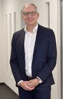 Oliver Flühler, Group Chief Financial Officer